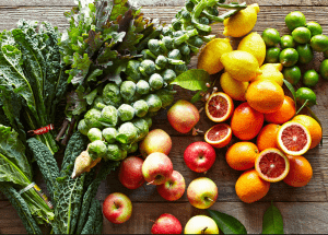 a group of fruits and vegetables on a wood surface Healthy Weight Loss Diets Walton on the Hill